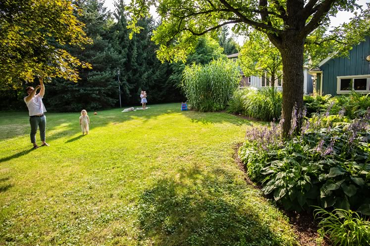 The expansive yard extends the family’s living space. Photo by Erin Fitzgibbon.